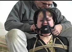 Alison Gagged Tight, Hoisted, Gagged Again, Groped, Then Tied in a Legs Spread Hogtie! - Part 2